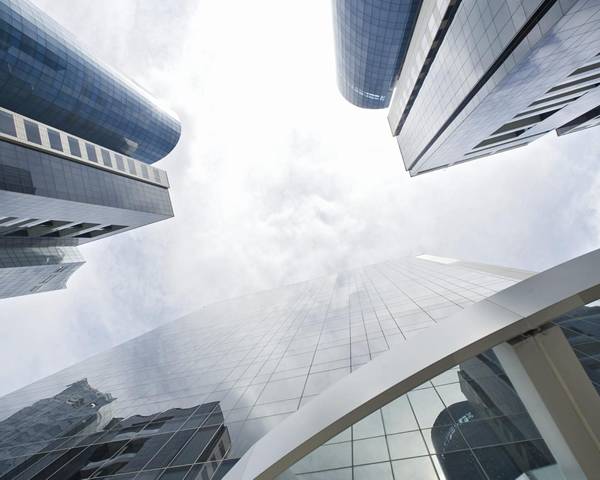 Four buildings under the sky.